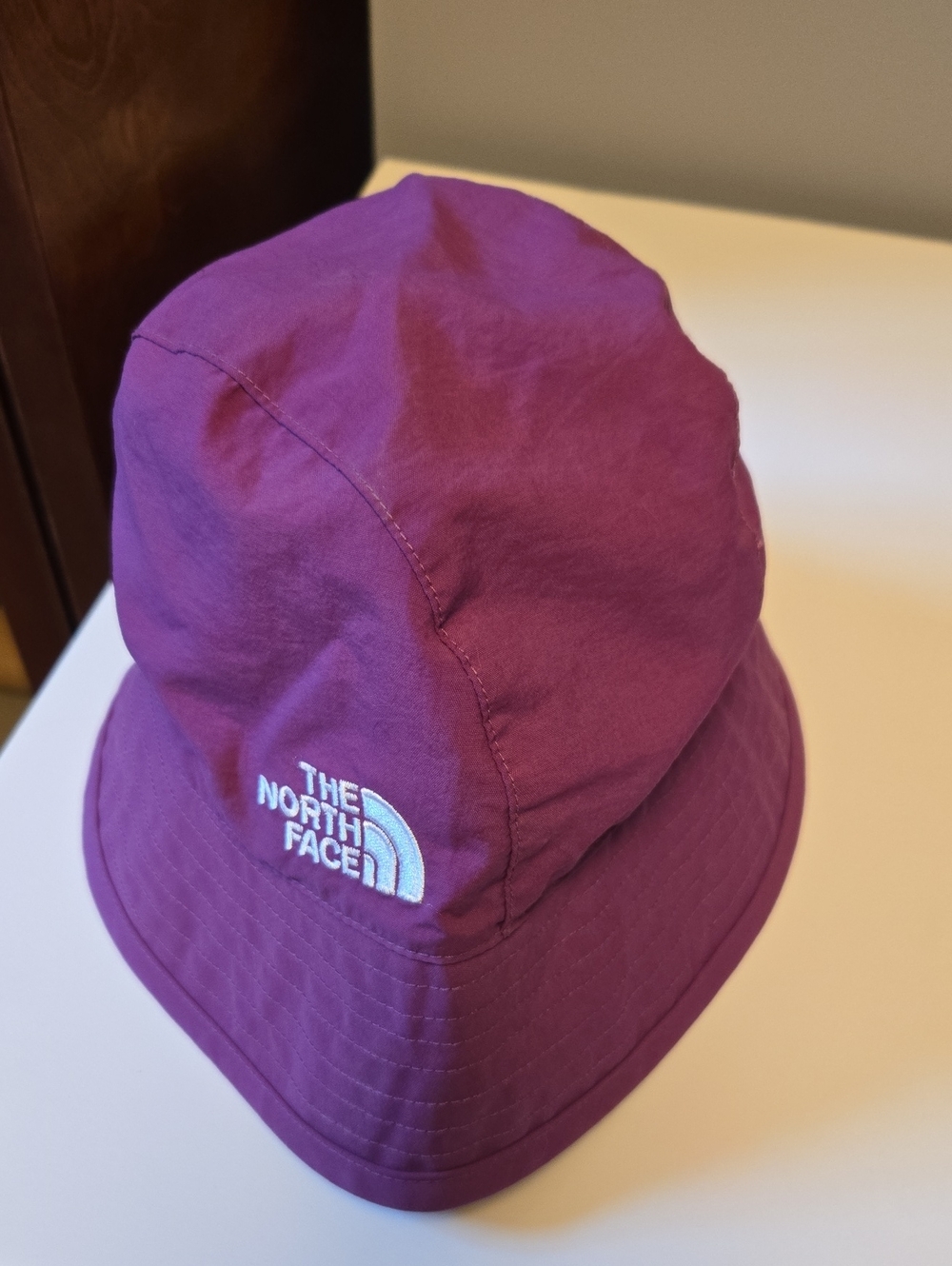 The North Face Purple Bucket Hat with White Logo